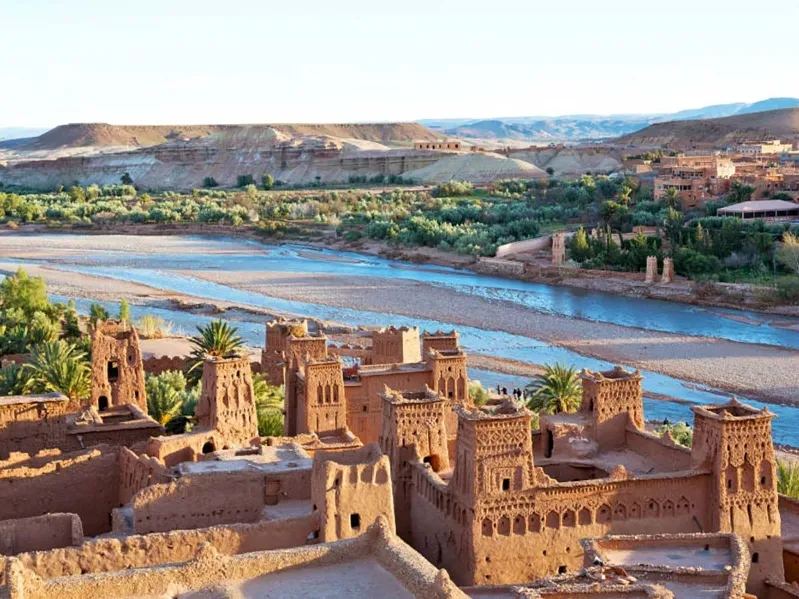 Enjoy our Morocco Trip from Spain to the old ancient kasbah of ait ben haddou and palm trees with green areas and oasis