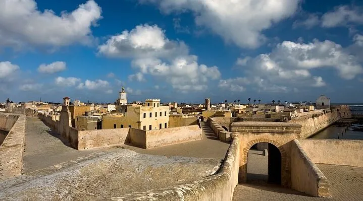el jadida, morocco skyline featuring historic architecture and modern buildings under a clear blue sky. A Day Trip to El Jadida