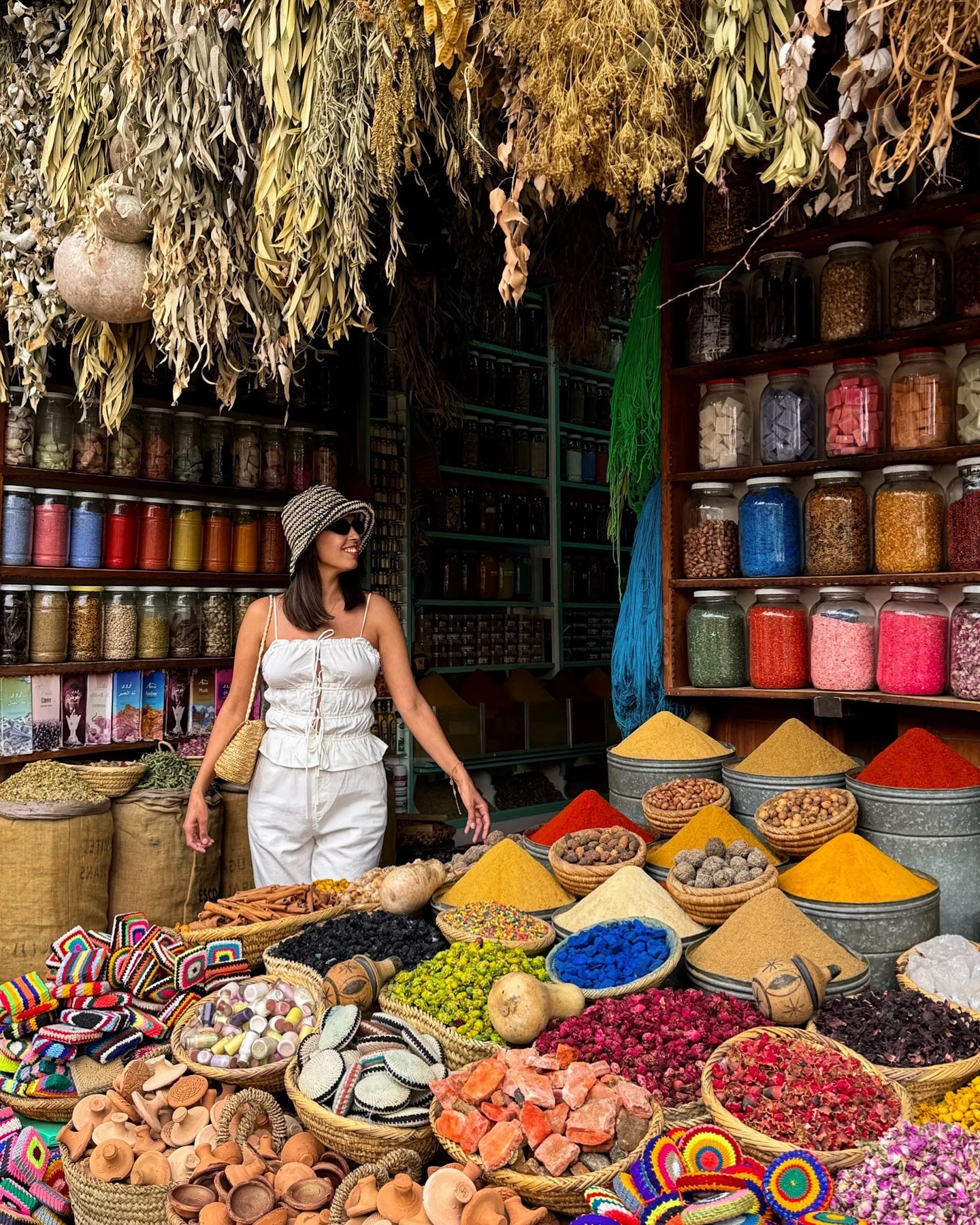 Colorful Moroccan spices at Marrakech souk - iconic photography subject during Morocco photography tour