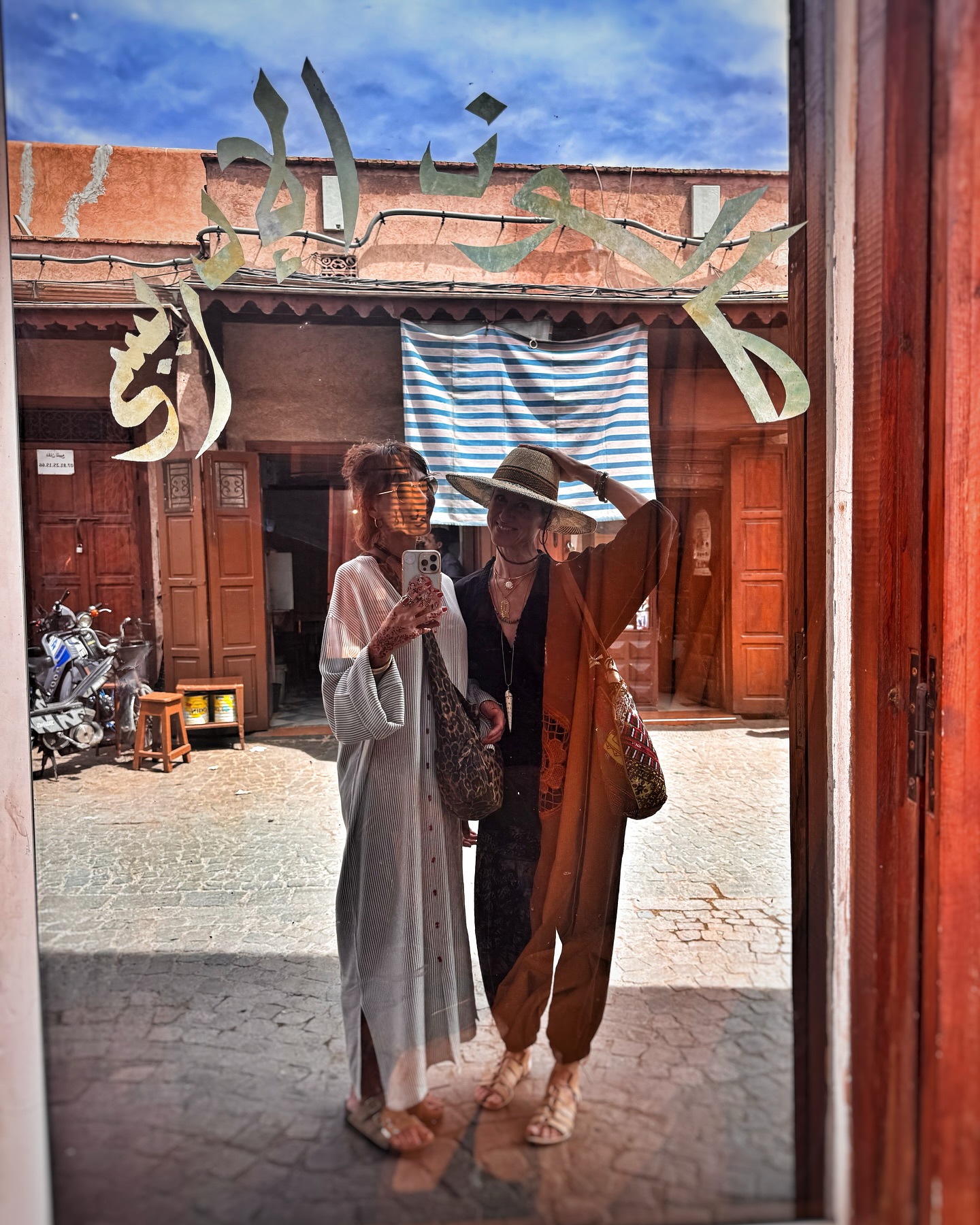 Panoramic rooftop view of Marrakech at golden hour during Morocco photography tour