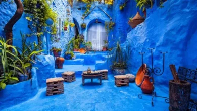 A scenic view of Chefchaouen, Morocco, showcasing its iconic blue-painted buildings and mountainous backdrop. 3 Days Casablanca to Chefchaouen & Tangier