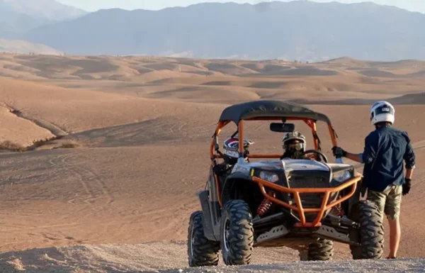 Buggy riding sandy terrain Agafay Morocco