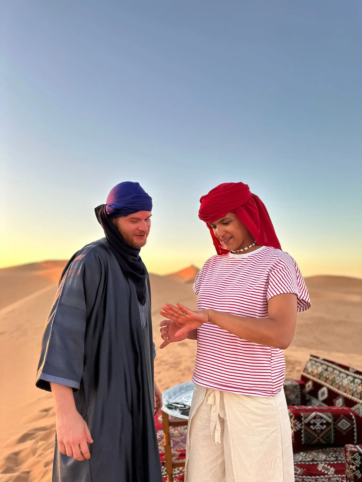 Happy clients enjoying their Agafay Desert tour experience with traditional Berber hospitality