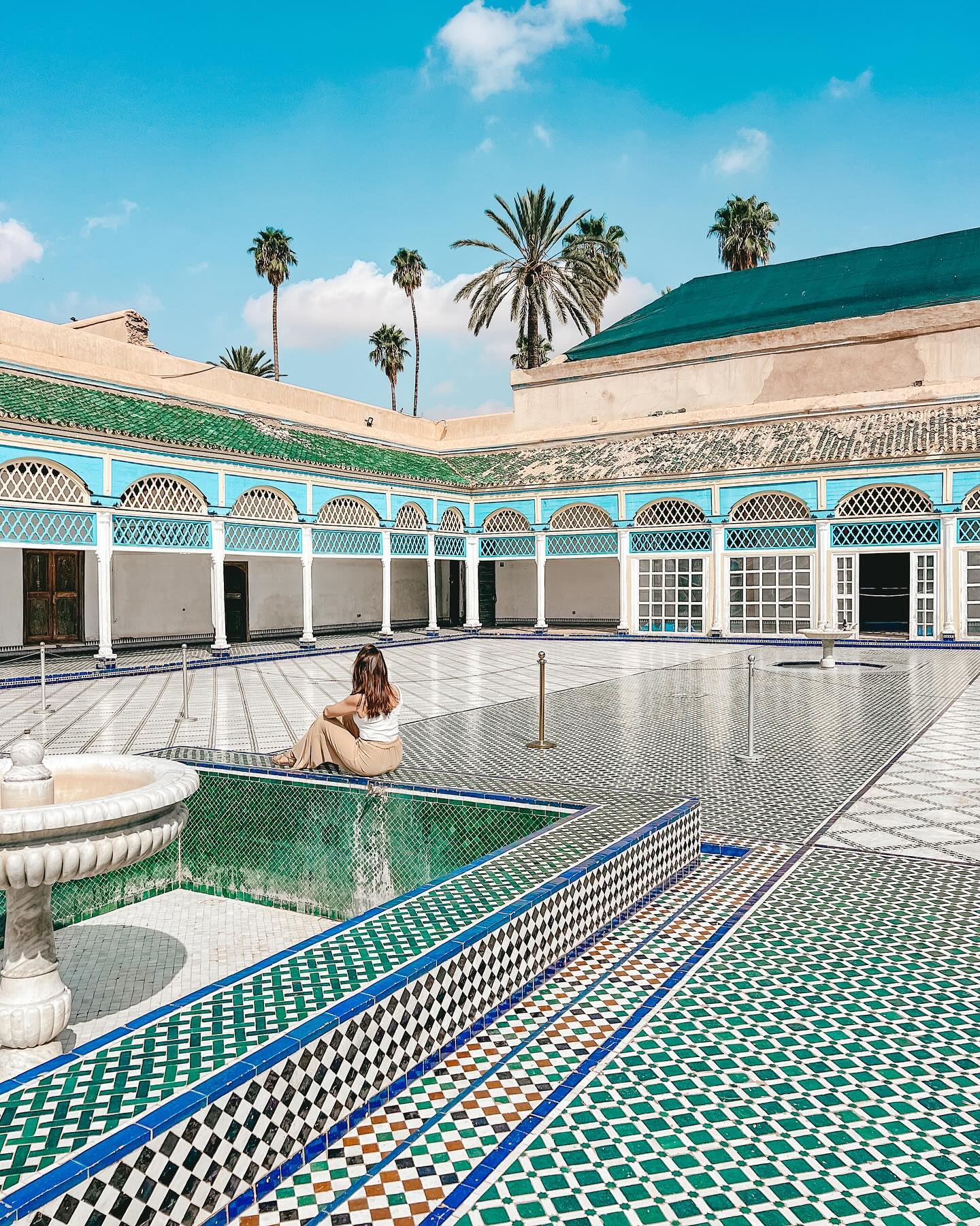 Bahia Palace Marrakech grand courtyard with intricate zellige tilework and carved stucco