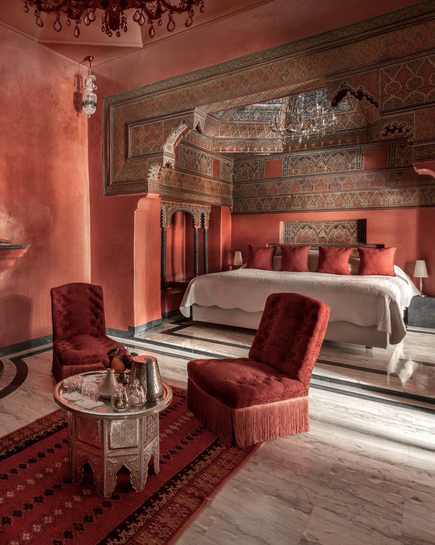 La Sultana Marrakech candlelit dining with Moroccan lanterns and Atlas Mountain views