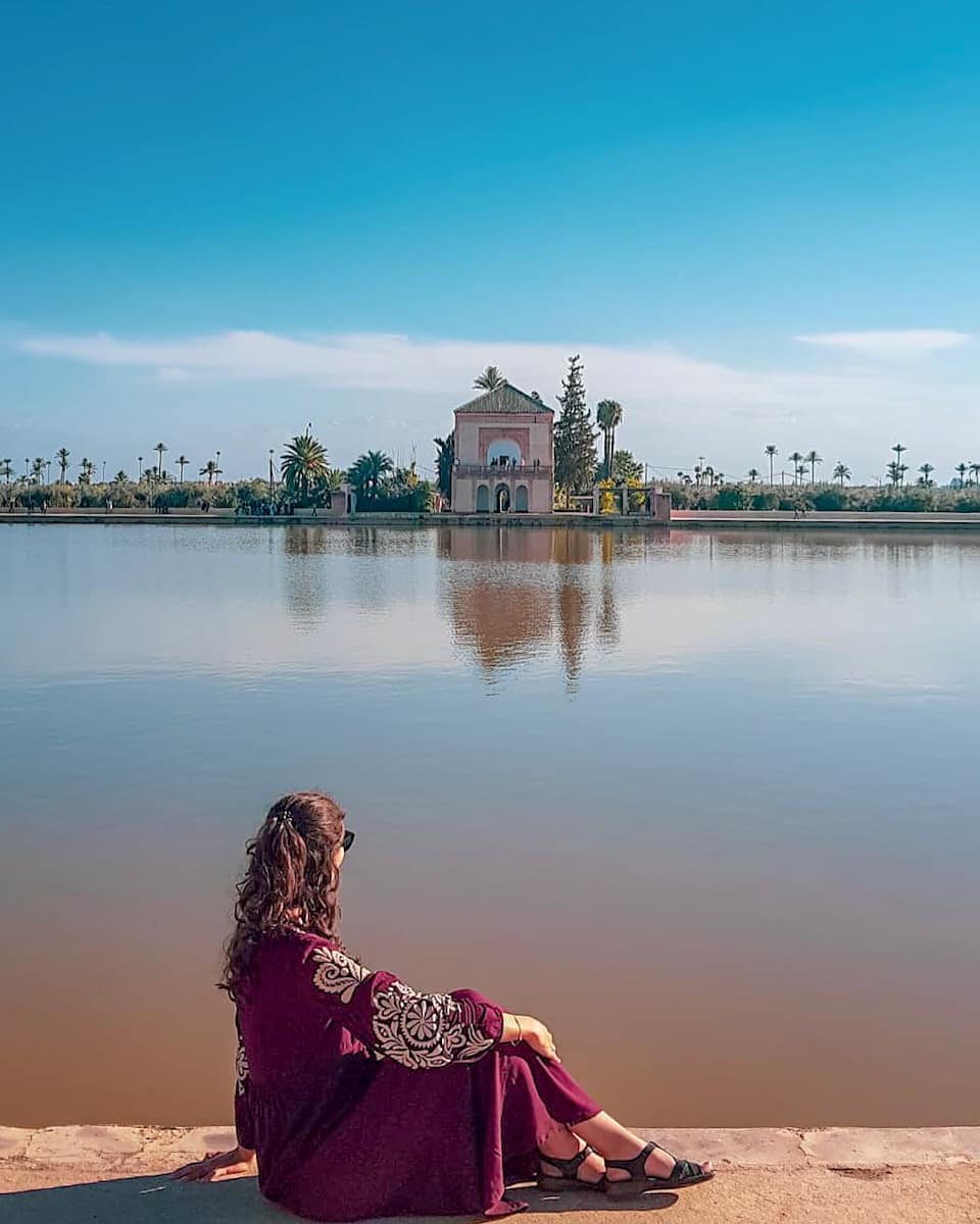 Menara Gardens Marrakech with reflecting basin and pavilion against Atlas Mountains backdrop
