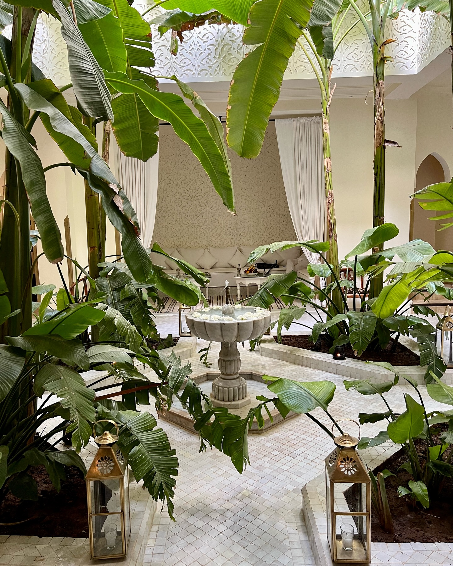 Riad Kheirredine Marrakech romantic rooftop pool with zellige tiles and Atlas Mountain backdrop