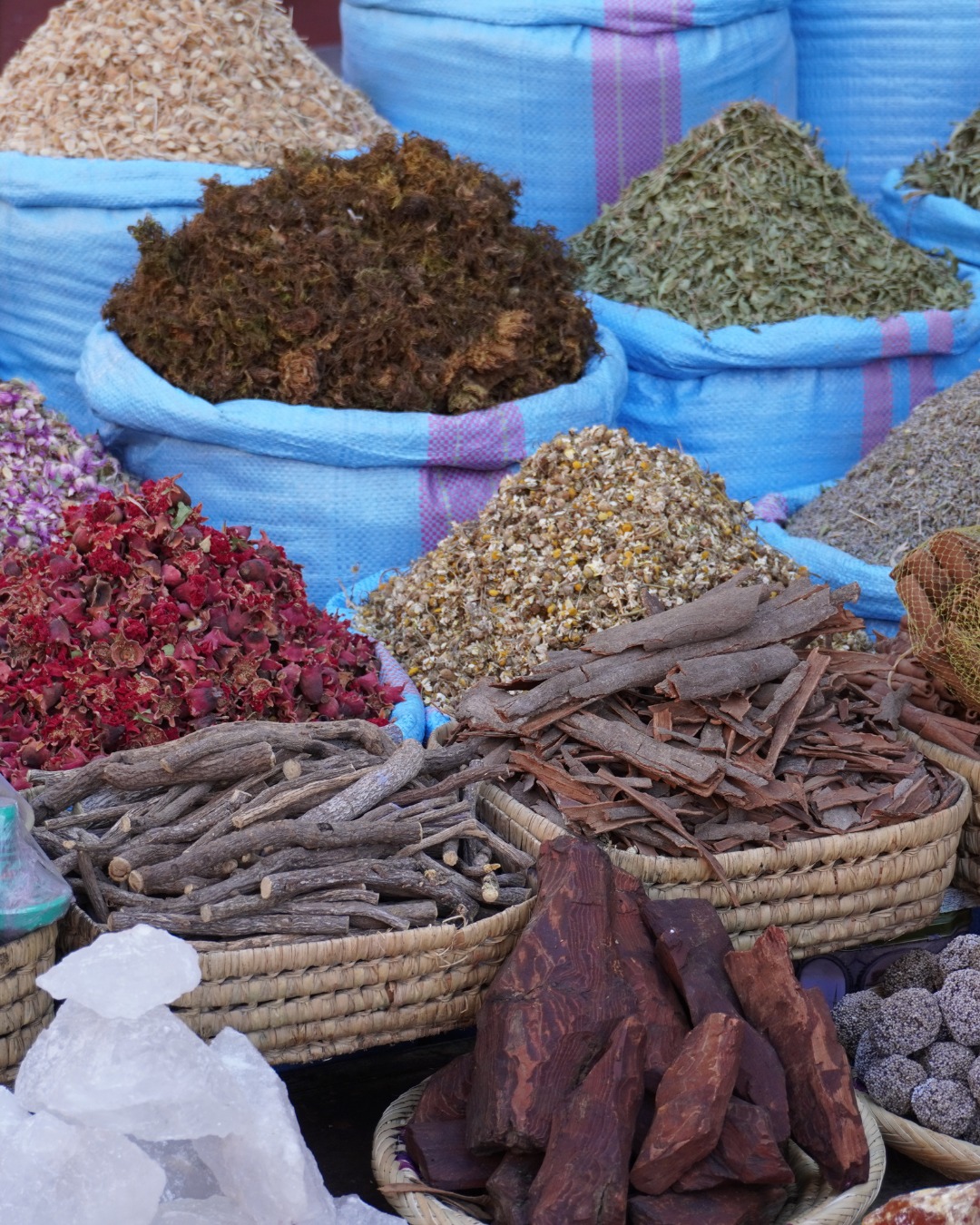 Souk el Attarine spice market Marrakech with colorful spices and herbs