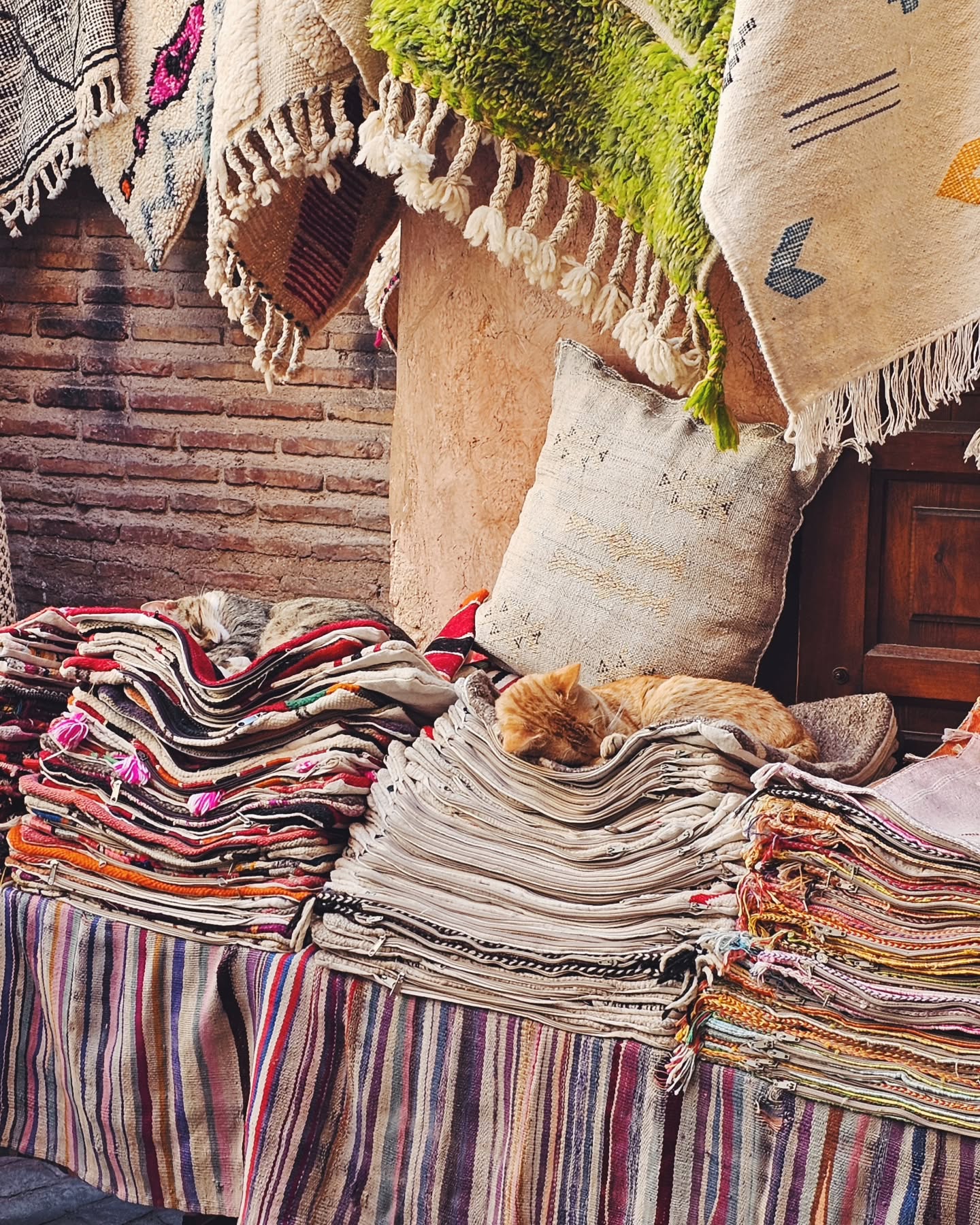 Handwoven Berber rugs at Marrakech carpet market
