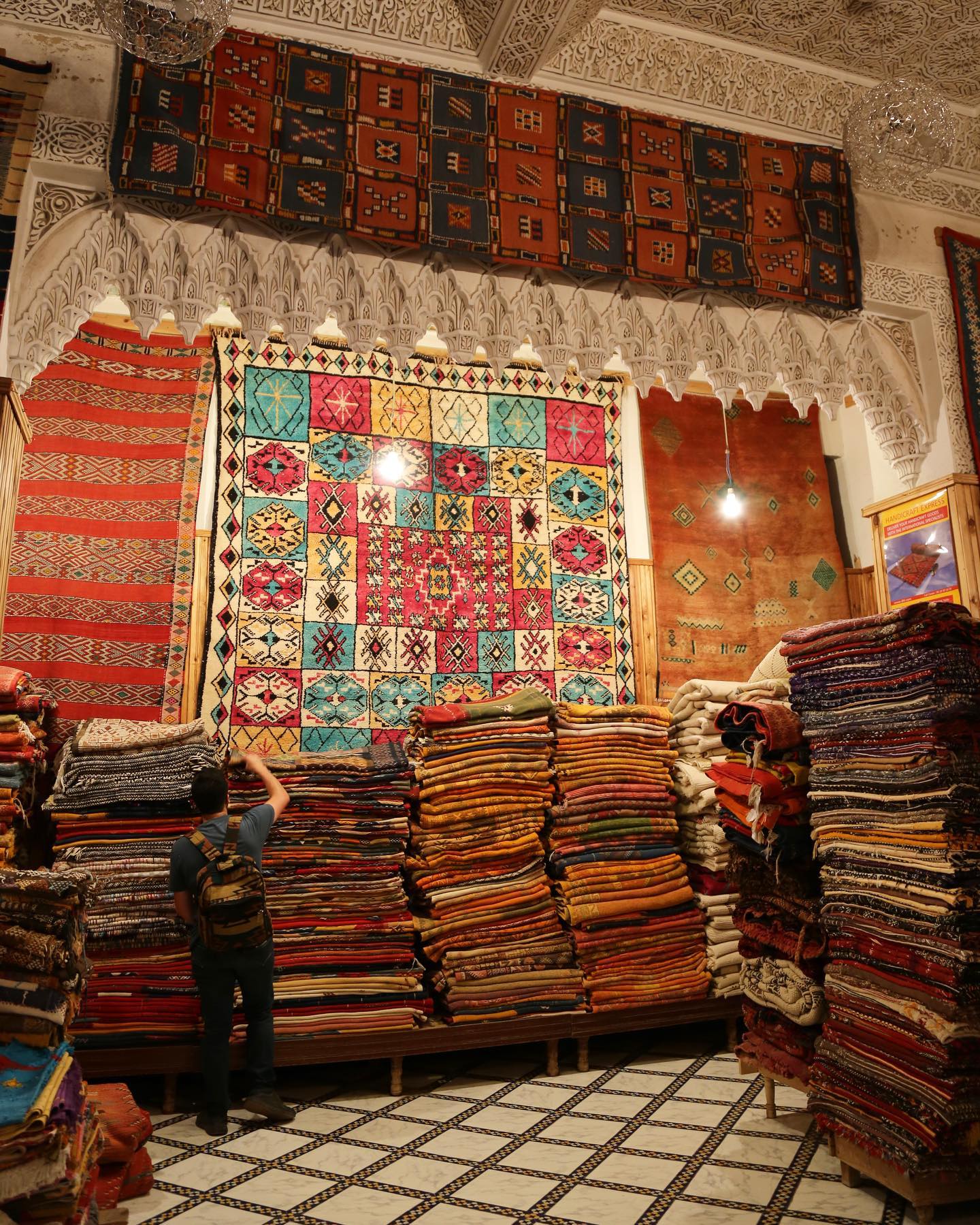 Colorful Moroccan carpets displayed in souk