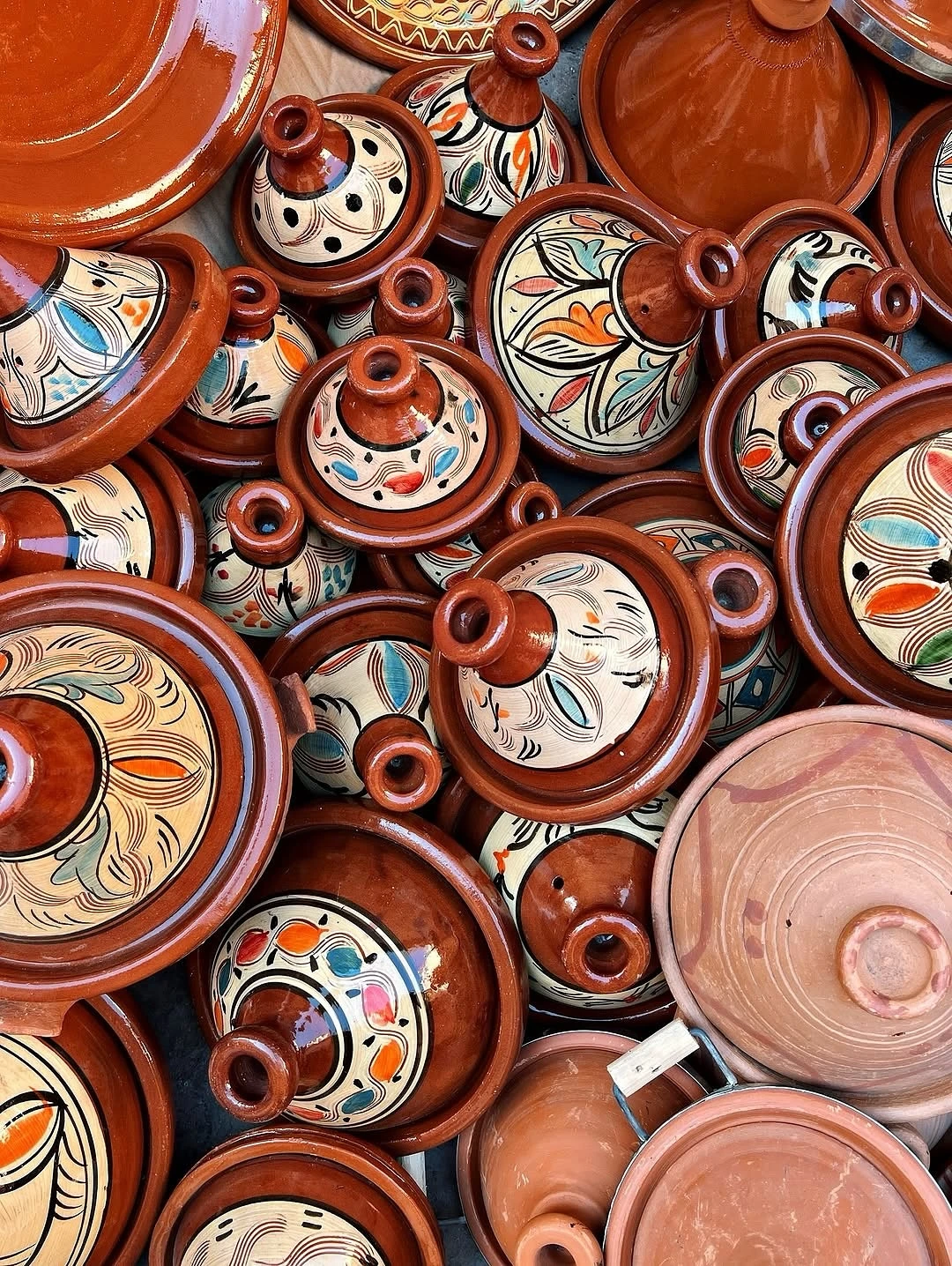 Traditional Moroccan tagine pots in marketplace