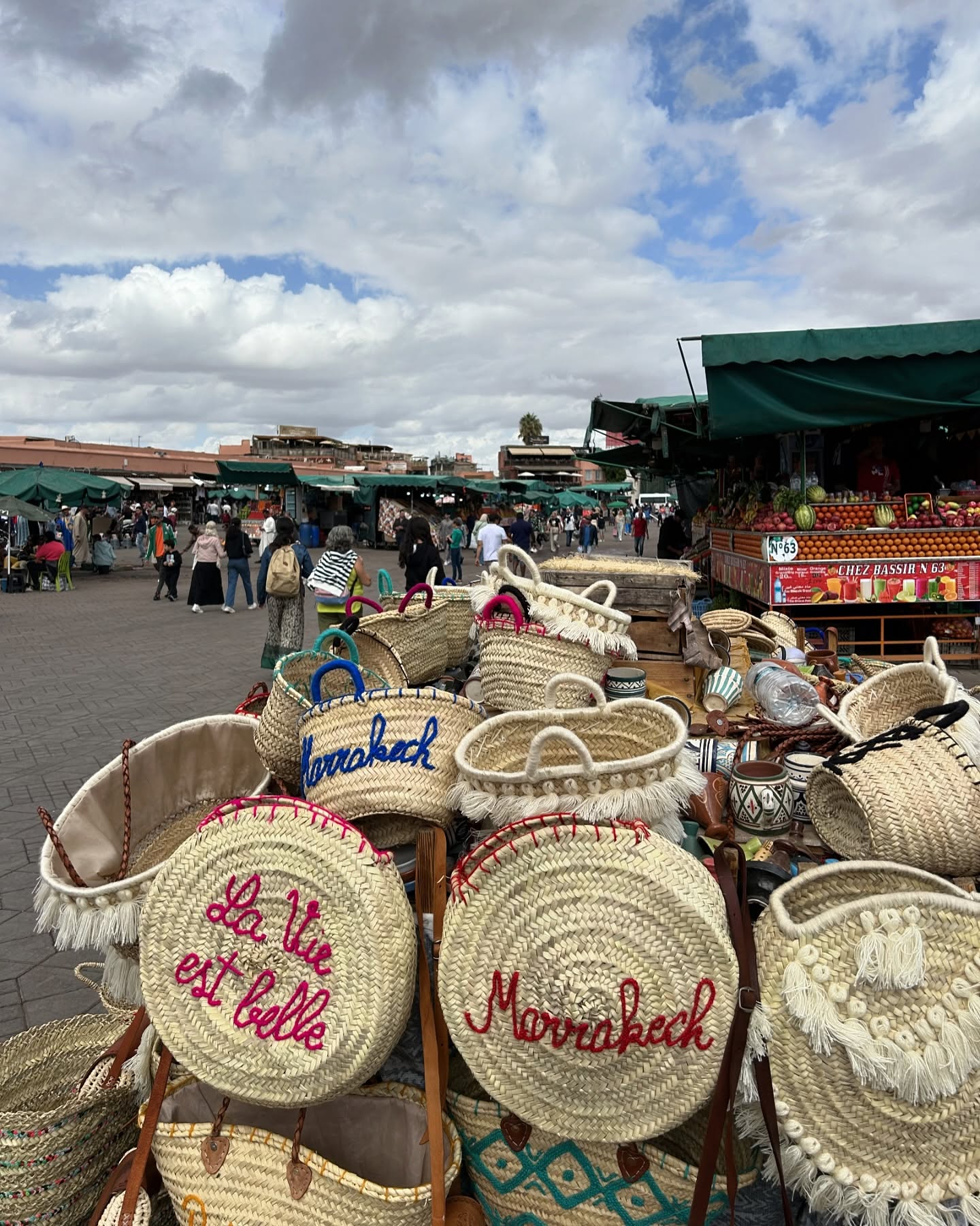 Colorful stalls inside Marrakech souk with traditional crafts and spices