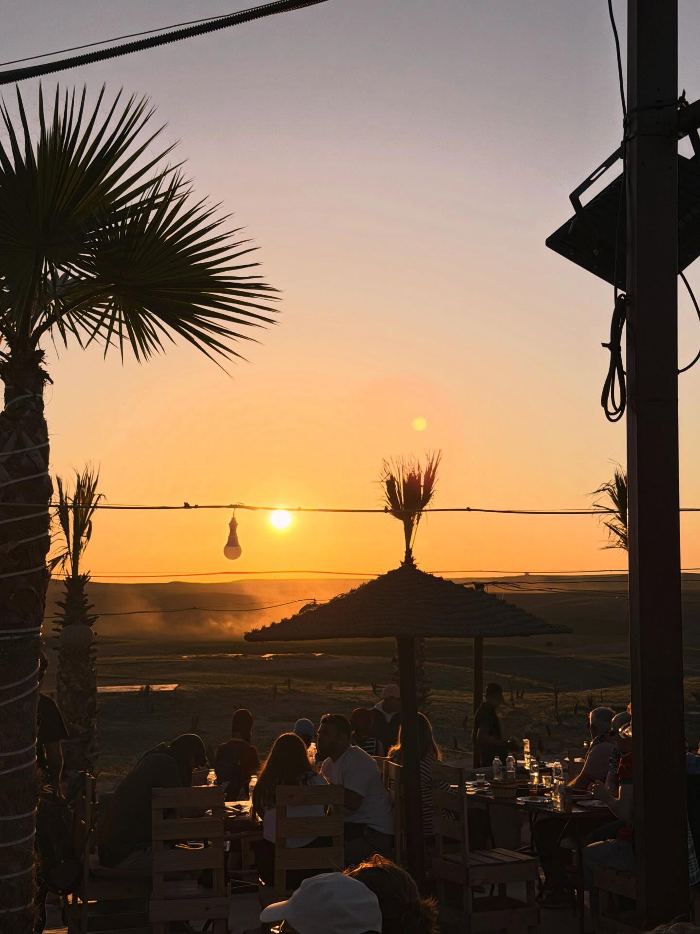 Agafay Desert sunset orange sky Morocco