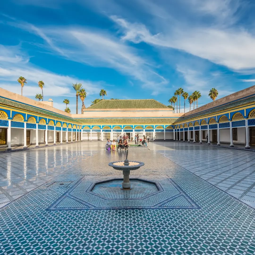 Bahia Palace courtyard with zellige tiles and carved cedar ceilings