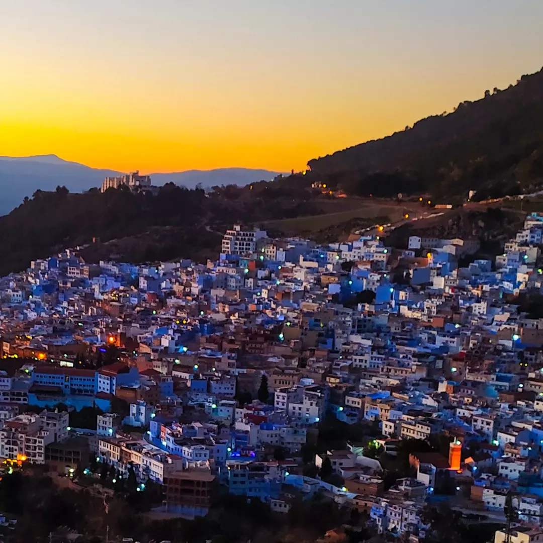 Chefchaouen rooftop sunset view Morocco blue city