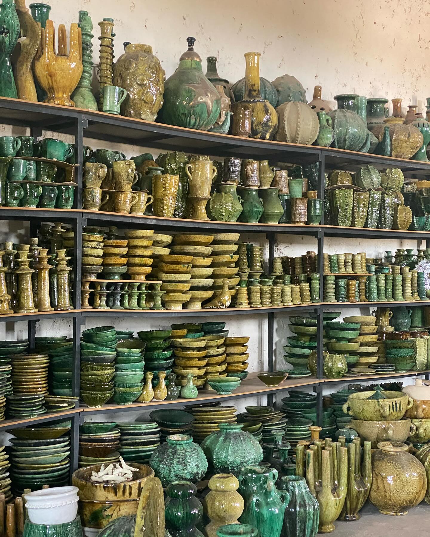 Moroccan pottery displayed in a souk