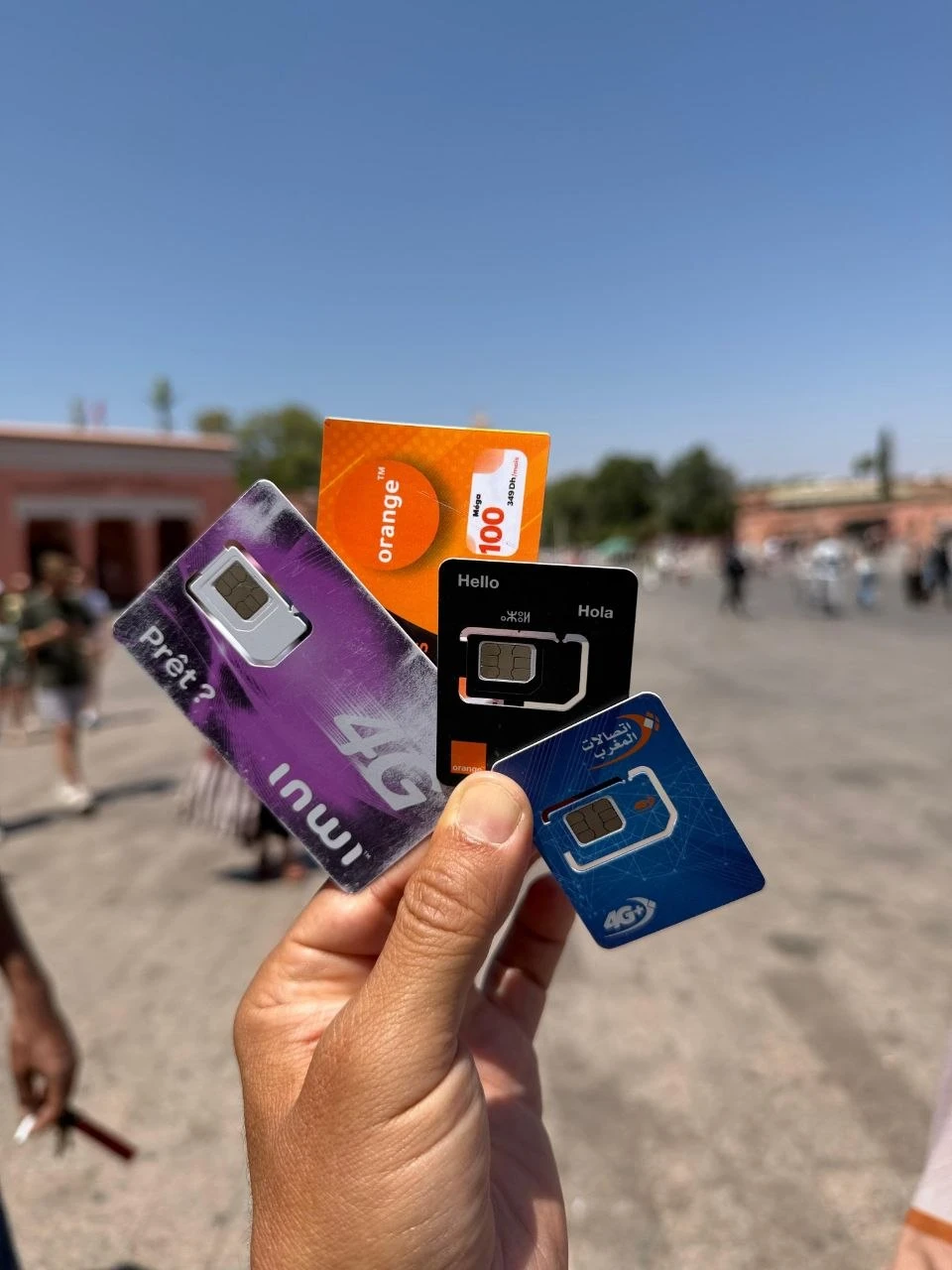 Buying a SIM card in Morocco — tourist at an operator kiosk