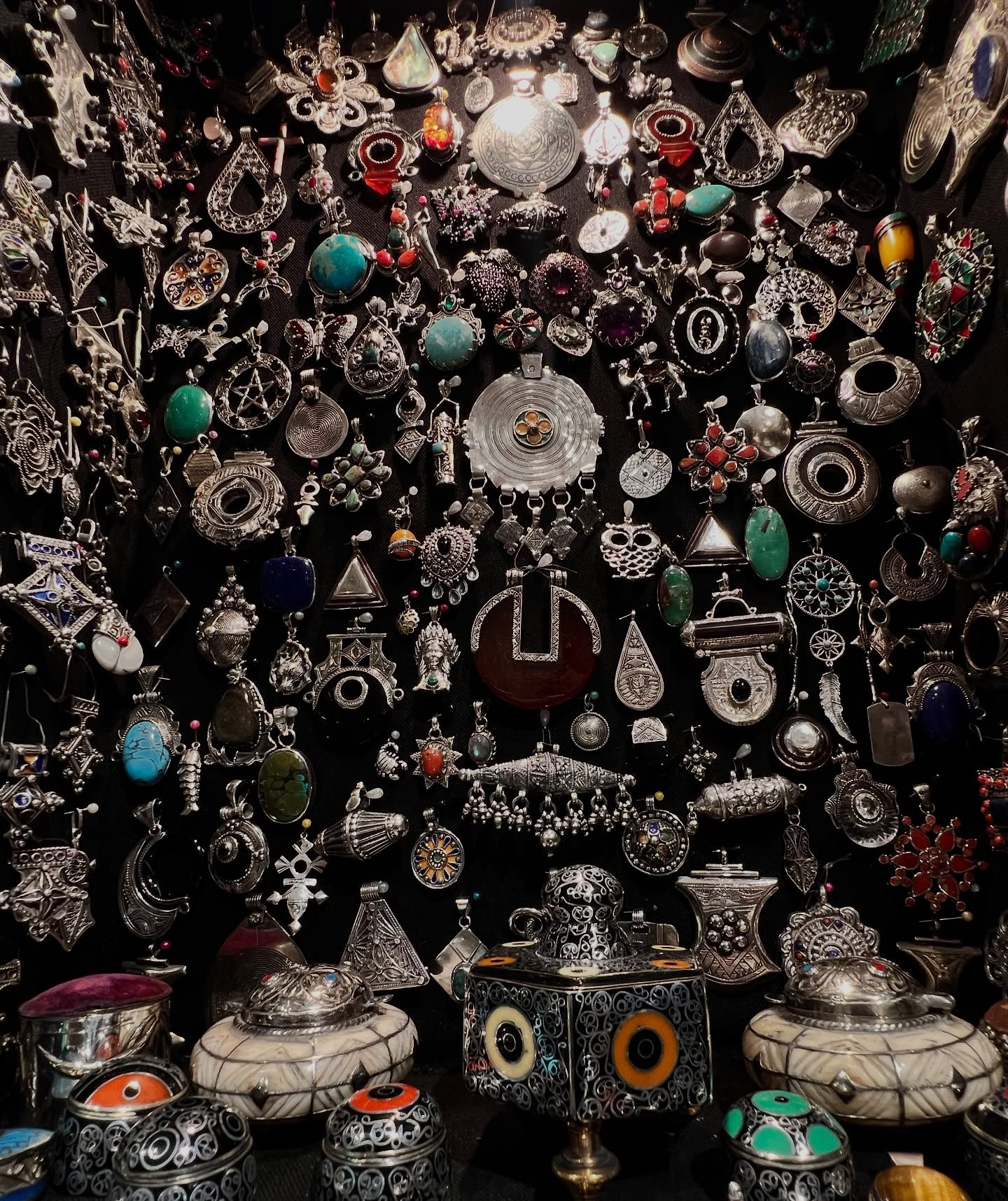 Amazigh silver fibula and khamsa pendants Morocco