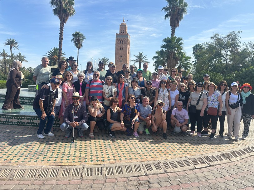 Group of international tourists exploring a Moroccan medina
