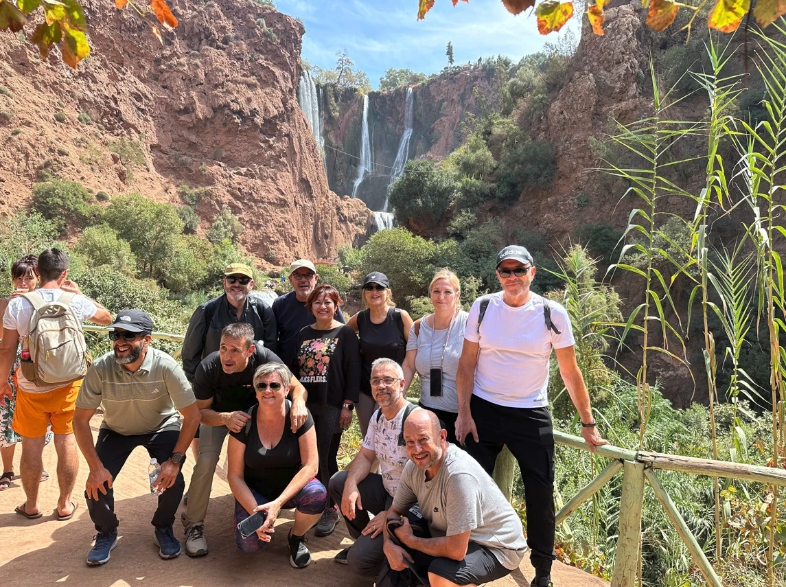 English-speaking tourists with local guide at Ouzoud Waterfalls Morocco