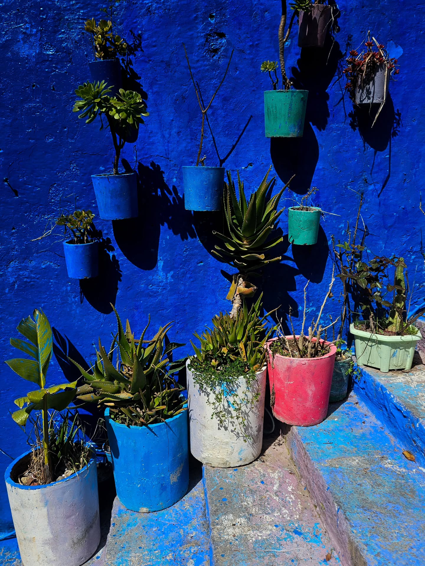 Close-up of blue painted walls and stairs in Chefchaouen blue city Morocco