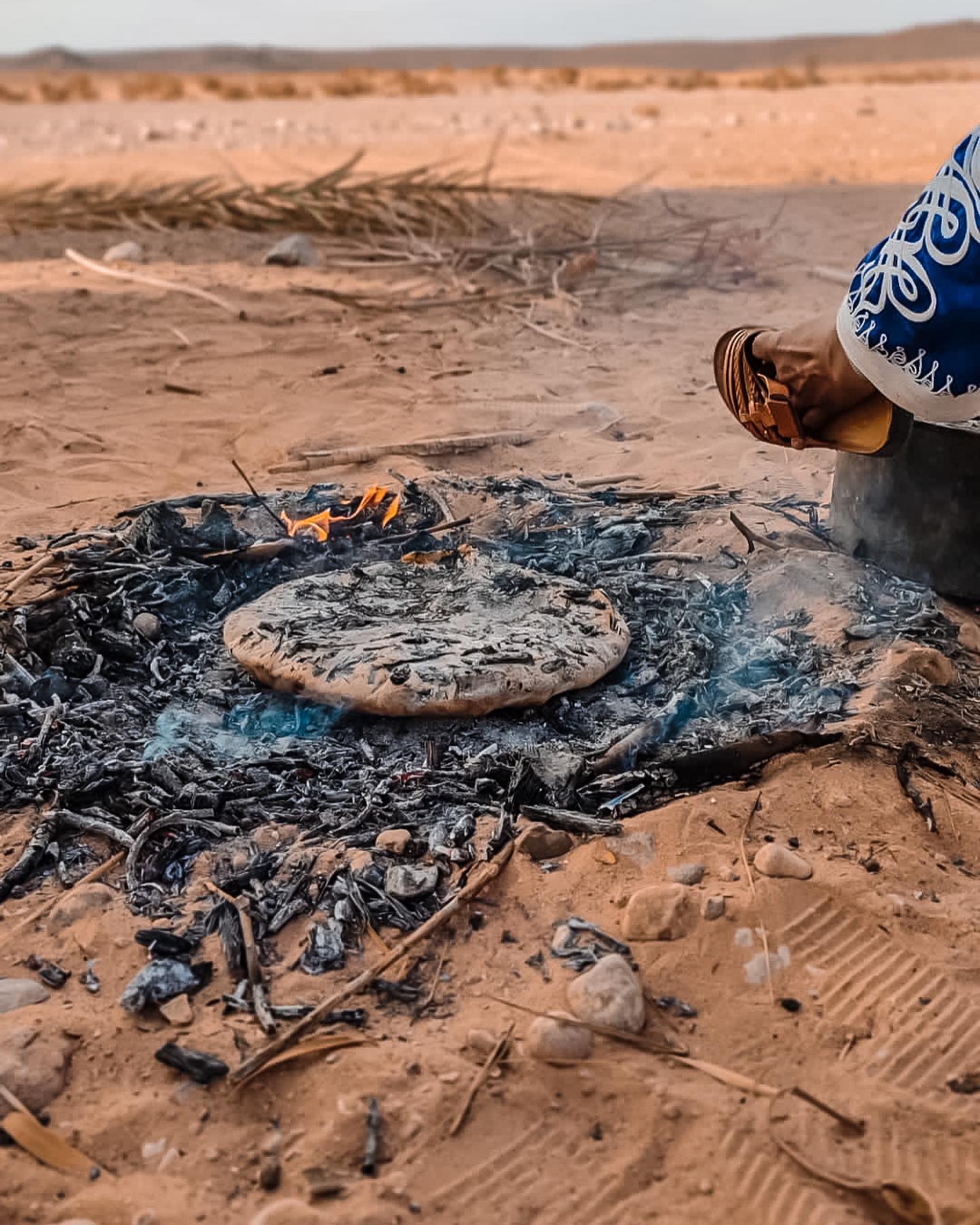 Step 5: Cooking Madfouna in desert sand or furn oven