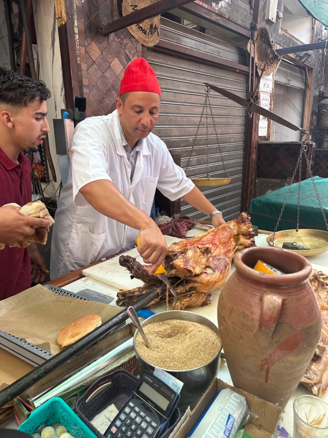 Traditional mechoui preparation at Chez Lamine Jemaa El Fna