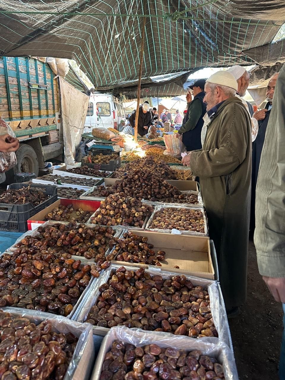 Date seller offering Moroccan dates at the weekly Souk Asni