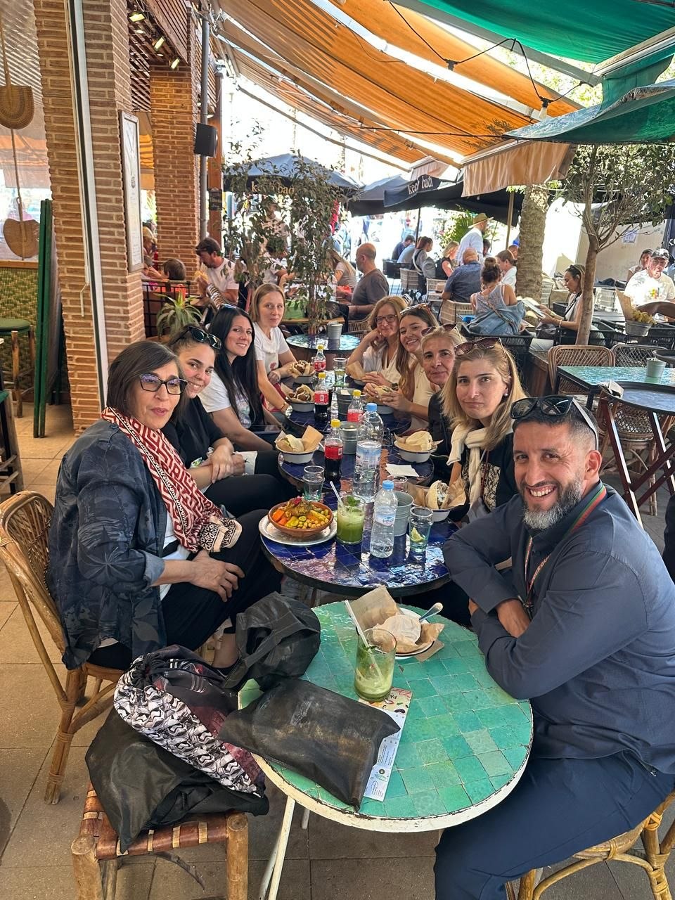 Tourists enjoying a healthy lunch at Mazel Café Marrakech