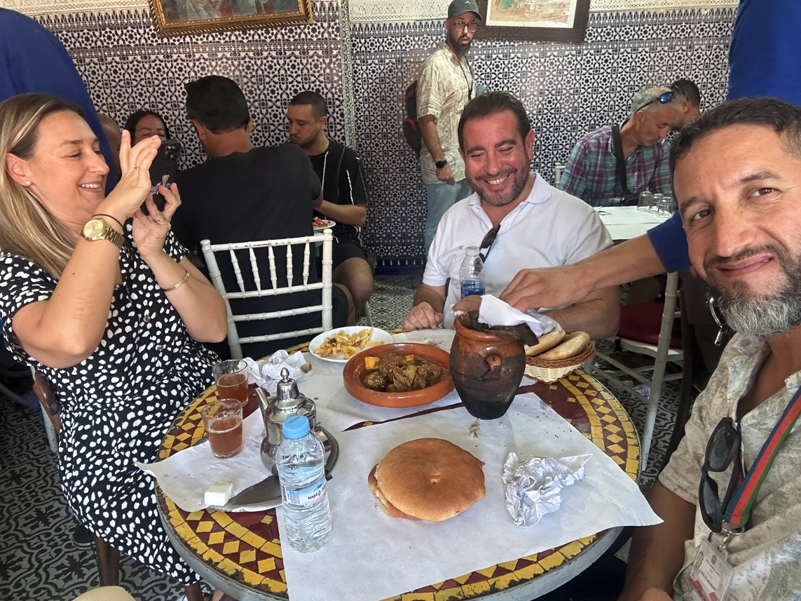 Guide Mouhssine with tourists at Chez Lamine Marrakech