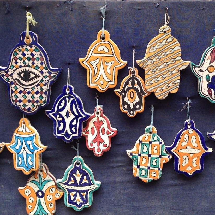 Hand of Fatima mosaic made with traditional Moroccan zellige tiles