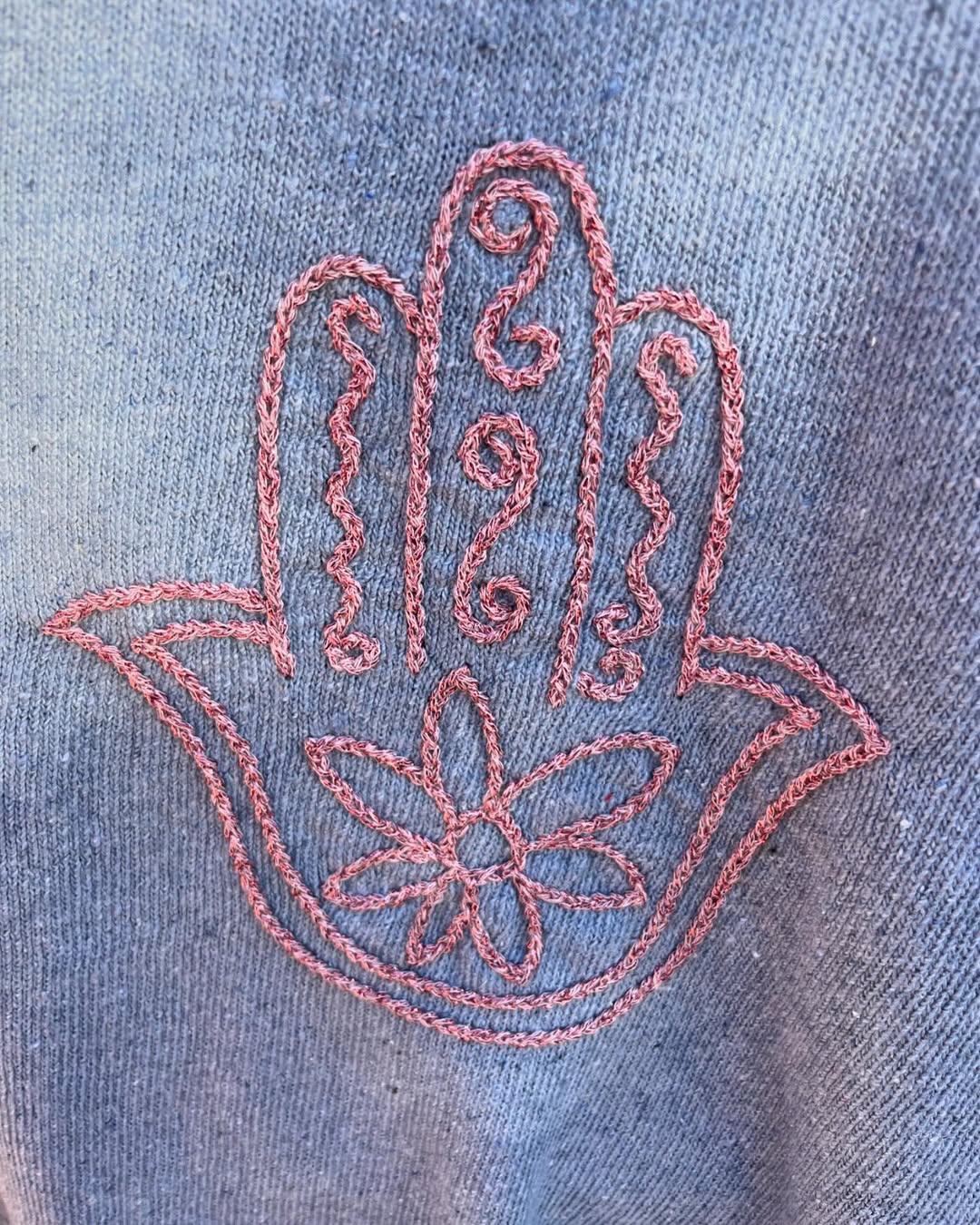 Contemporary Moroccan fashion with Khamsa print