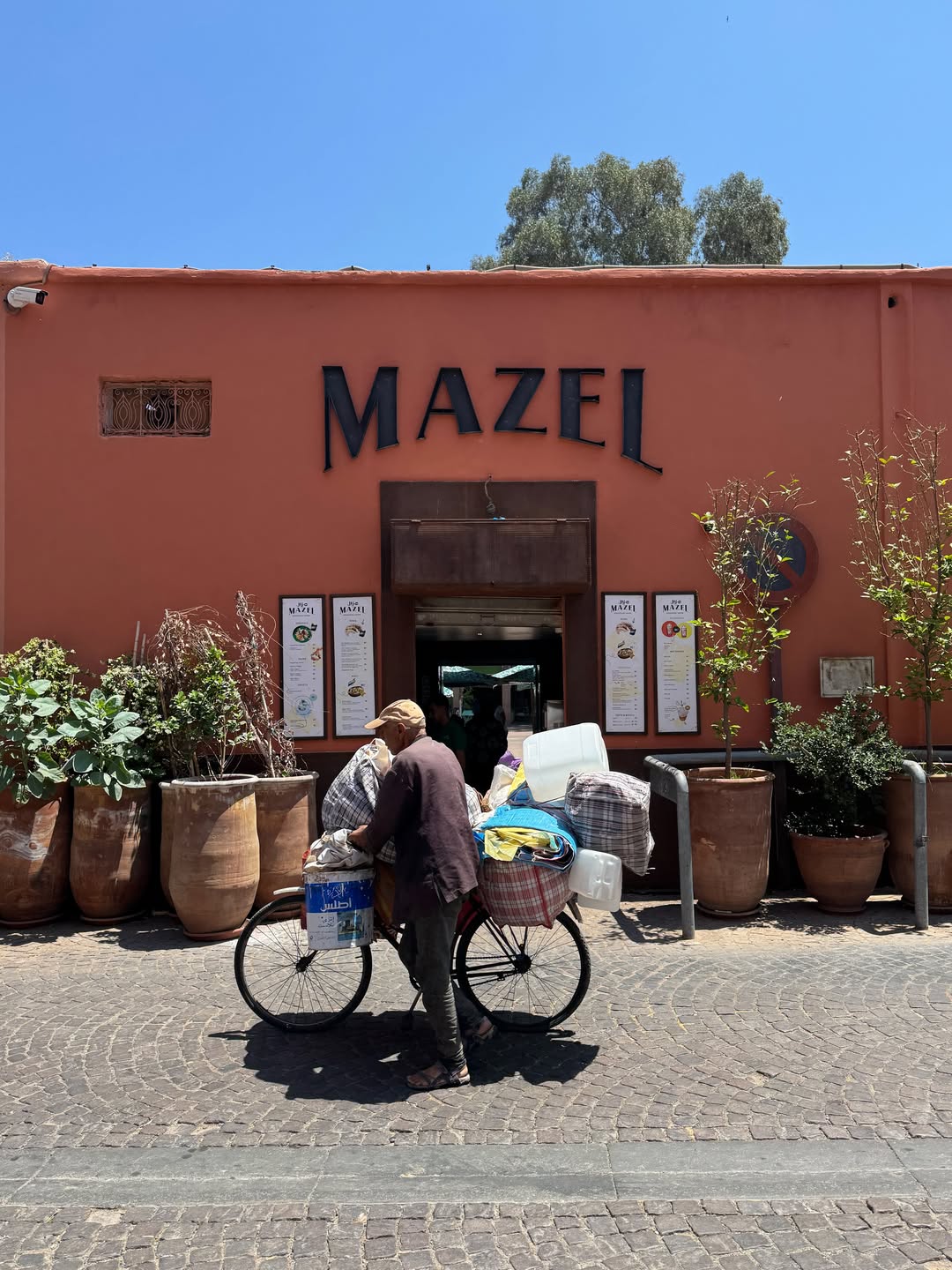 Mazel Café Marrakech interior — colourful pop-art Moroccan design at Place des Ferblantiers