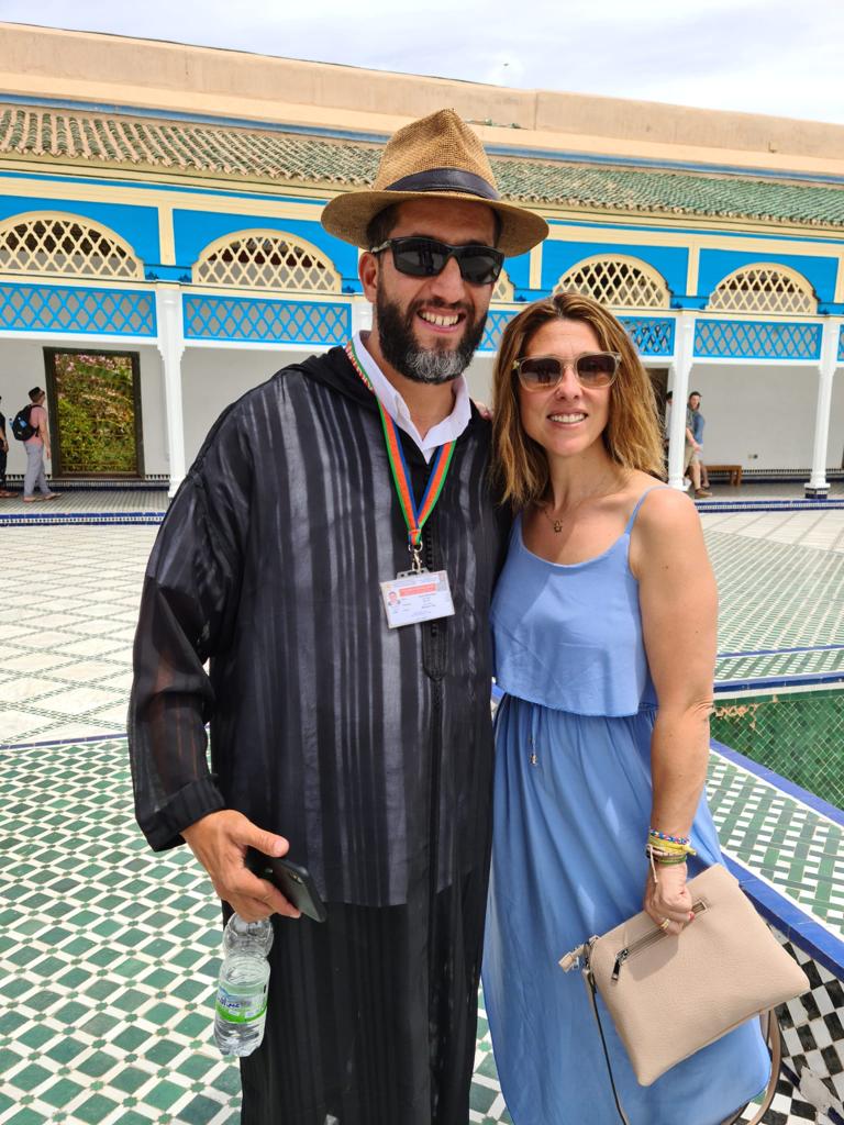 Tour guide with a tourist at Bahia Palace, Marrakech