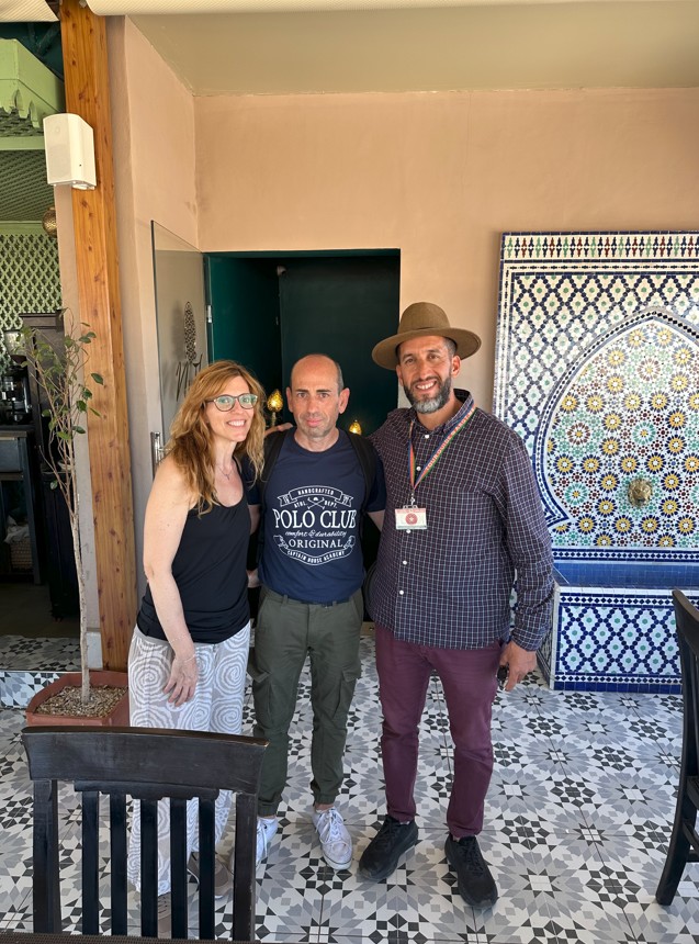 Guide Mouhssine with tourists at Mythe Restaurant Marrakech
