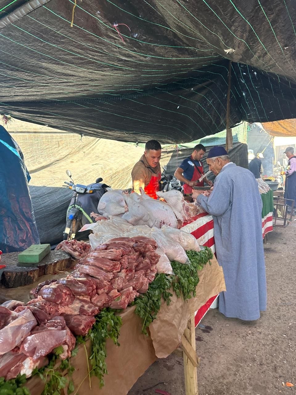Visitors exploring the Asni weekly souk with local guide Mouhssine