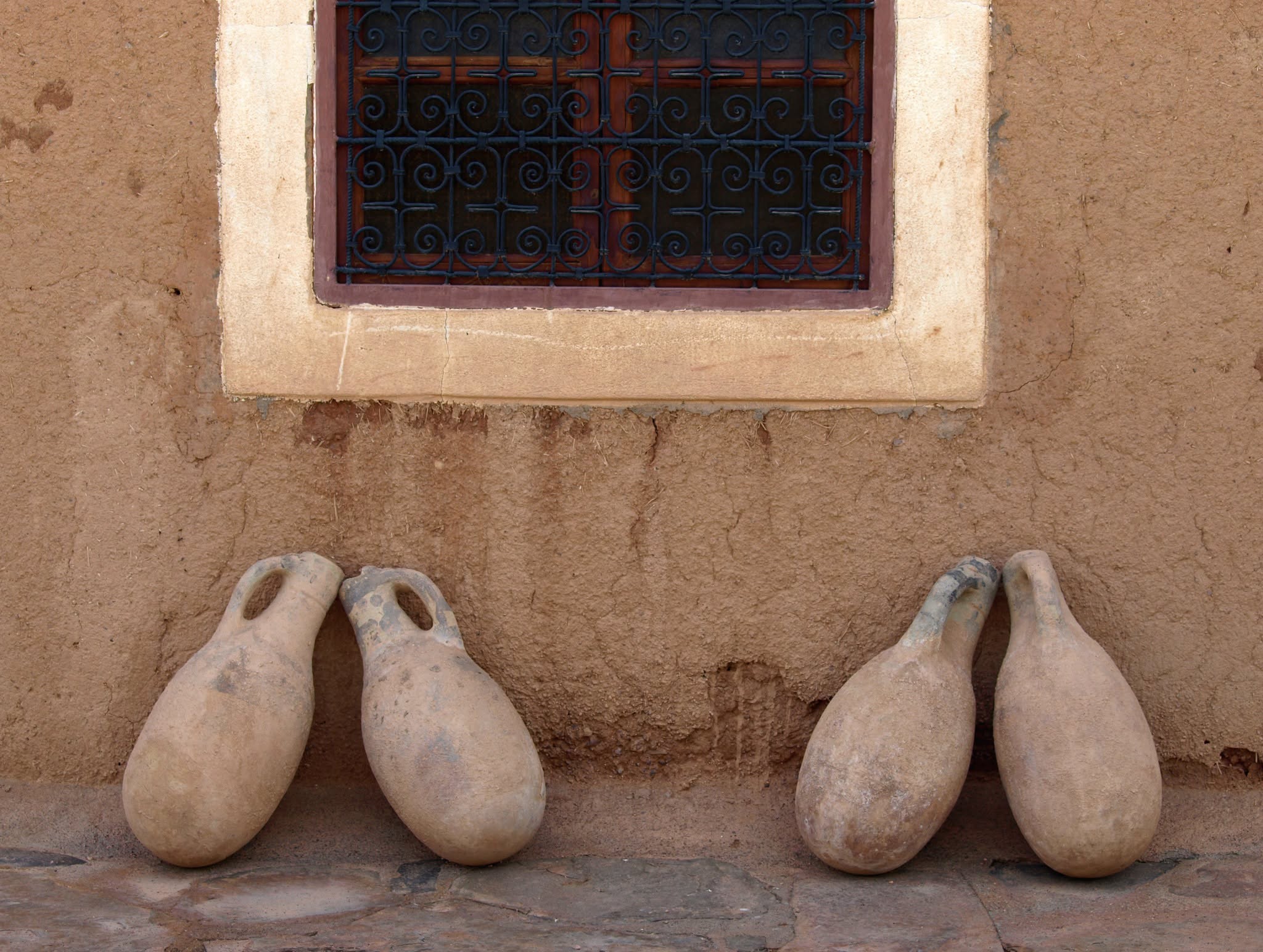 Close view of the rammed earth walls and decorative brickwork of Kasbah Oulad Othmane
