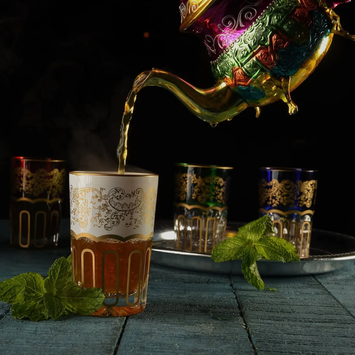 Moroccan mint tea being poured during a private guided visit