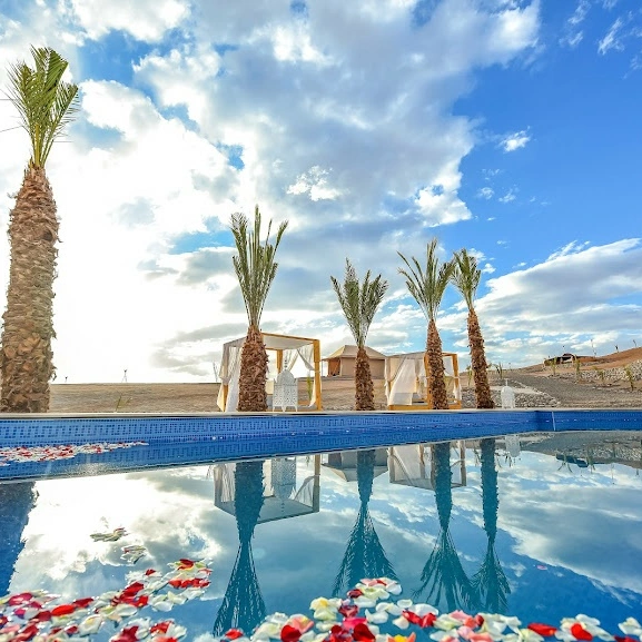 Full day experience in Agafay with pool swim, camel ride and desert dinner